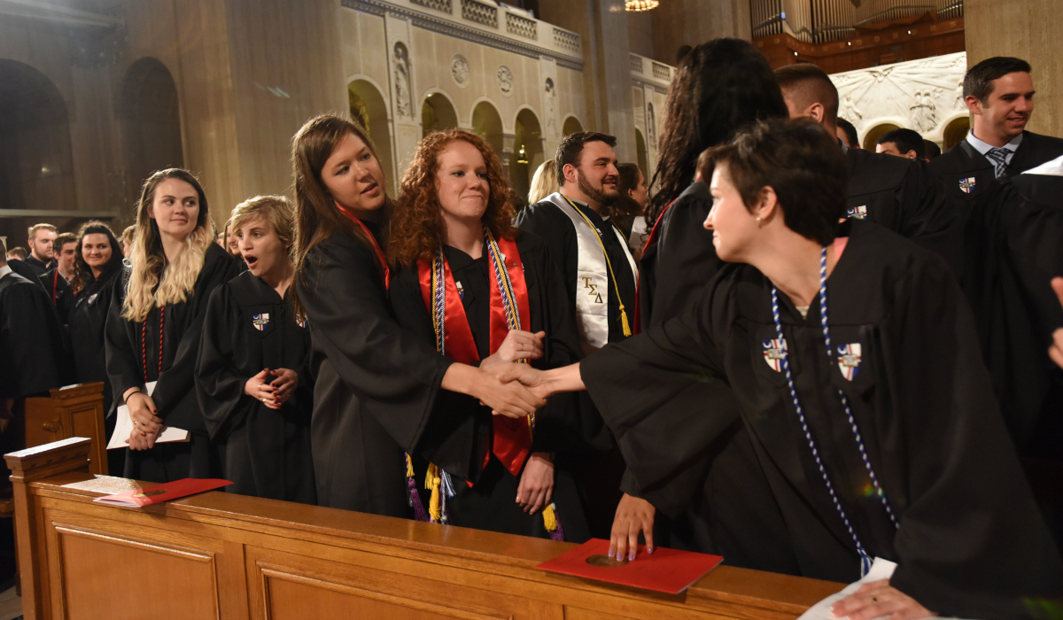Student receiving communion